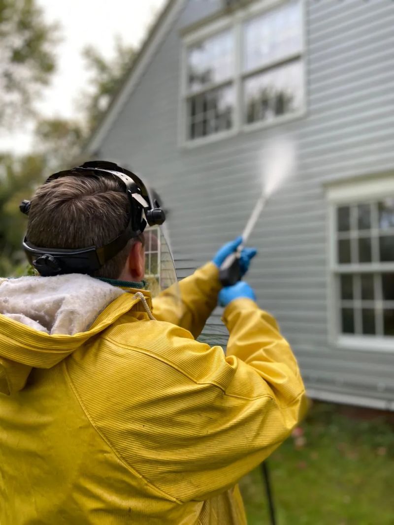 Clean residential siding after power washing